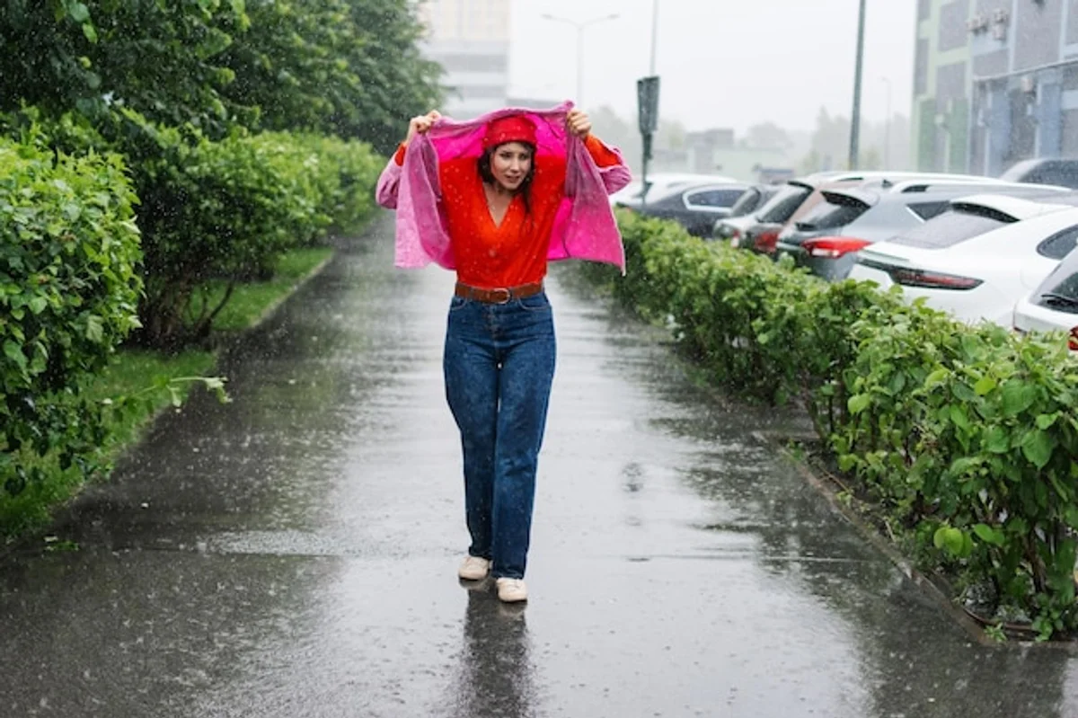 people walking in heavy rain without umbrella carefree