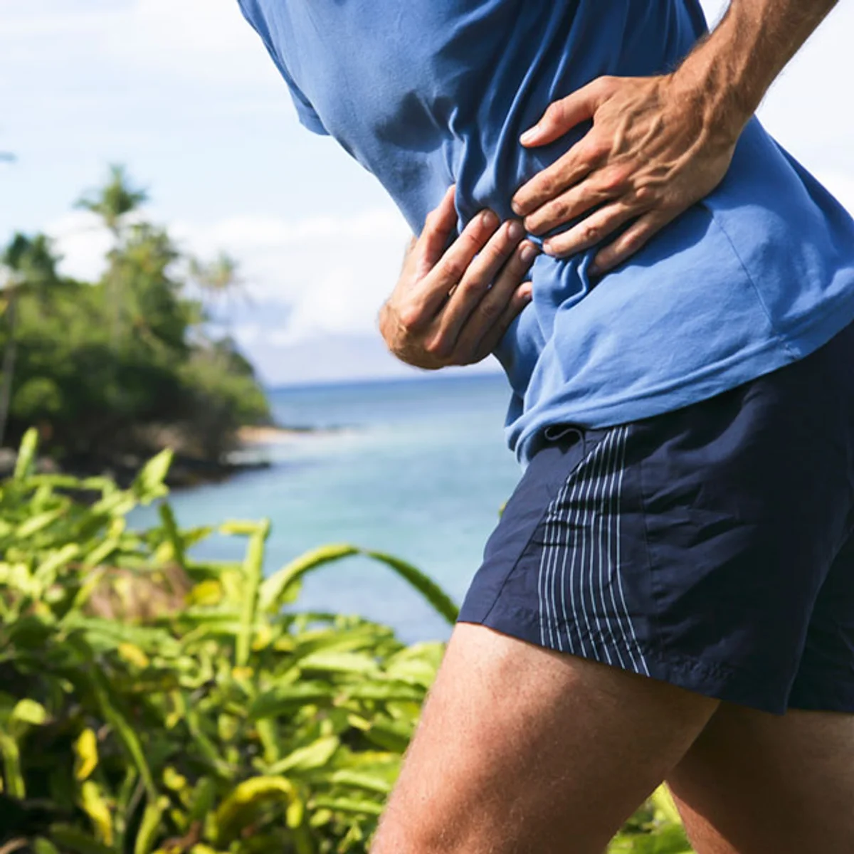 runner side stitch outdoors breathing exercise