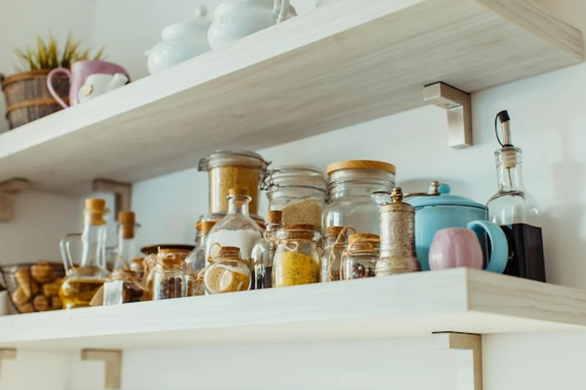 old spice jars in kitchen shelf