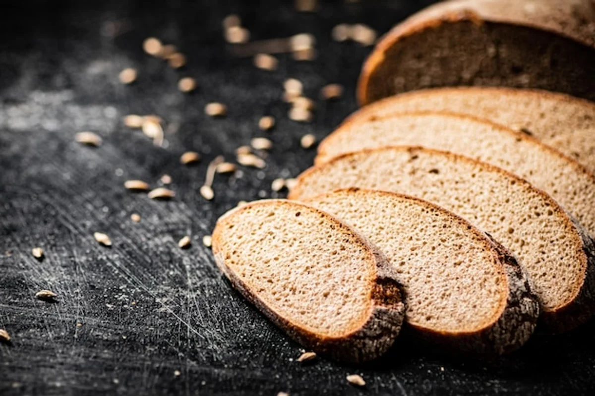fresh rye whole grain bread slice on breakfast table