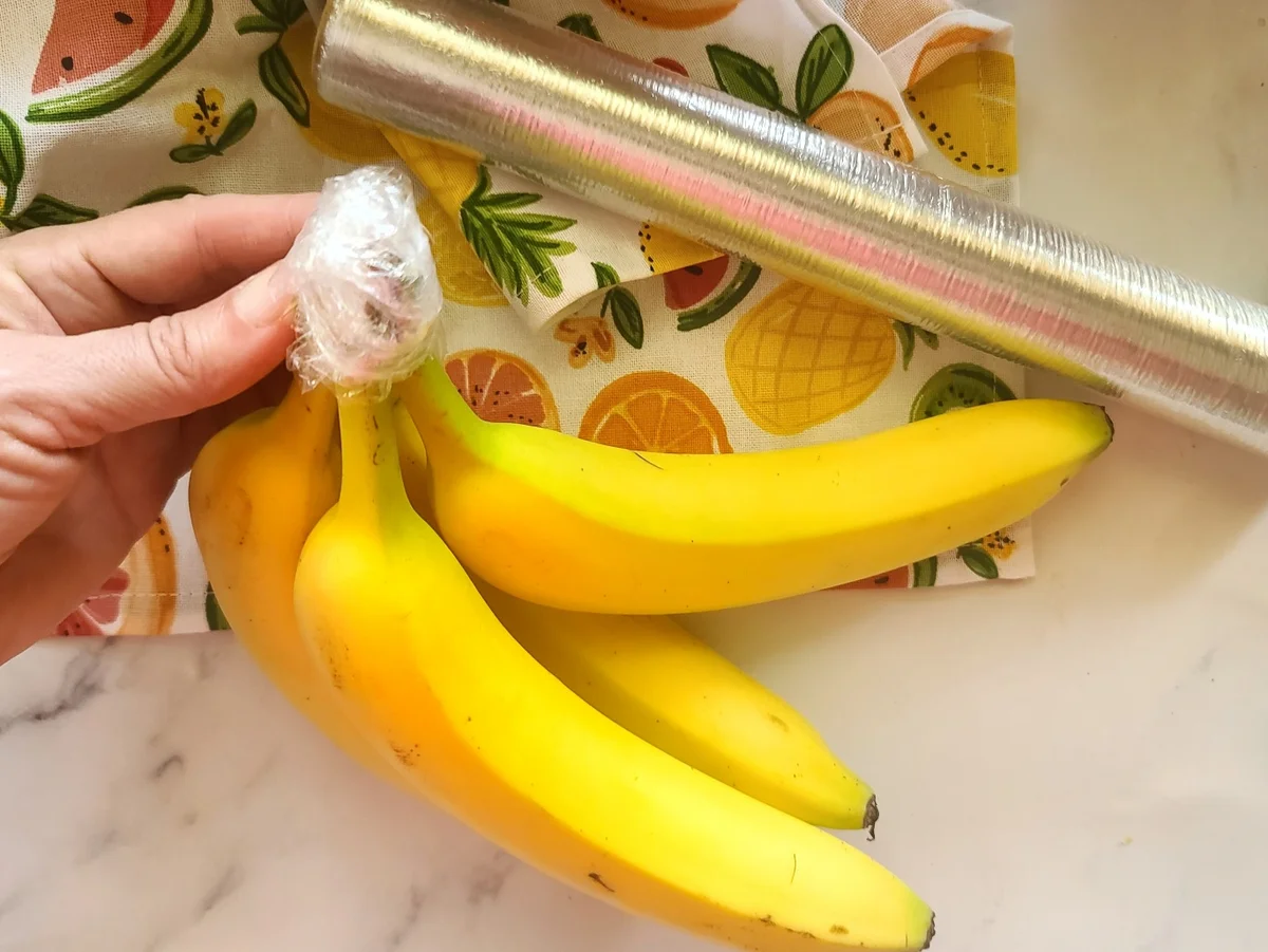 banana bunch stored with plastic wrap hacks kitchen