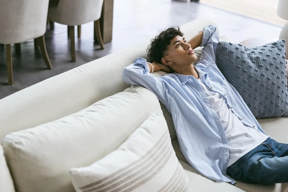 man meditating living room modern daylight calm