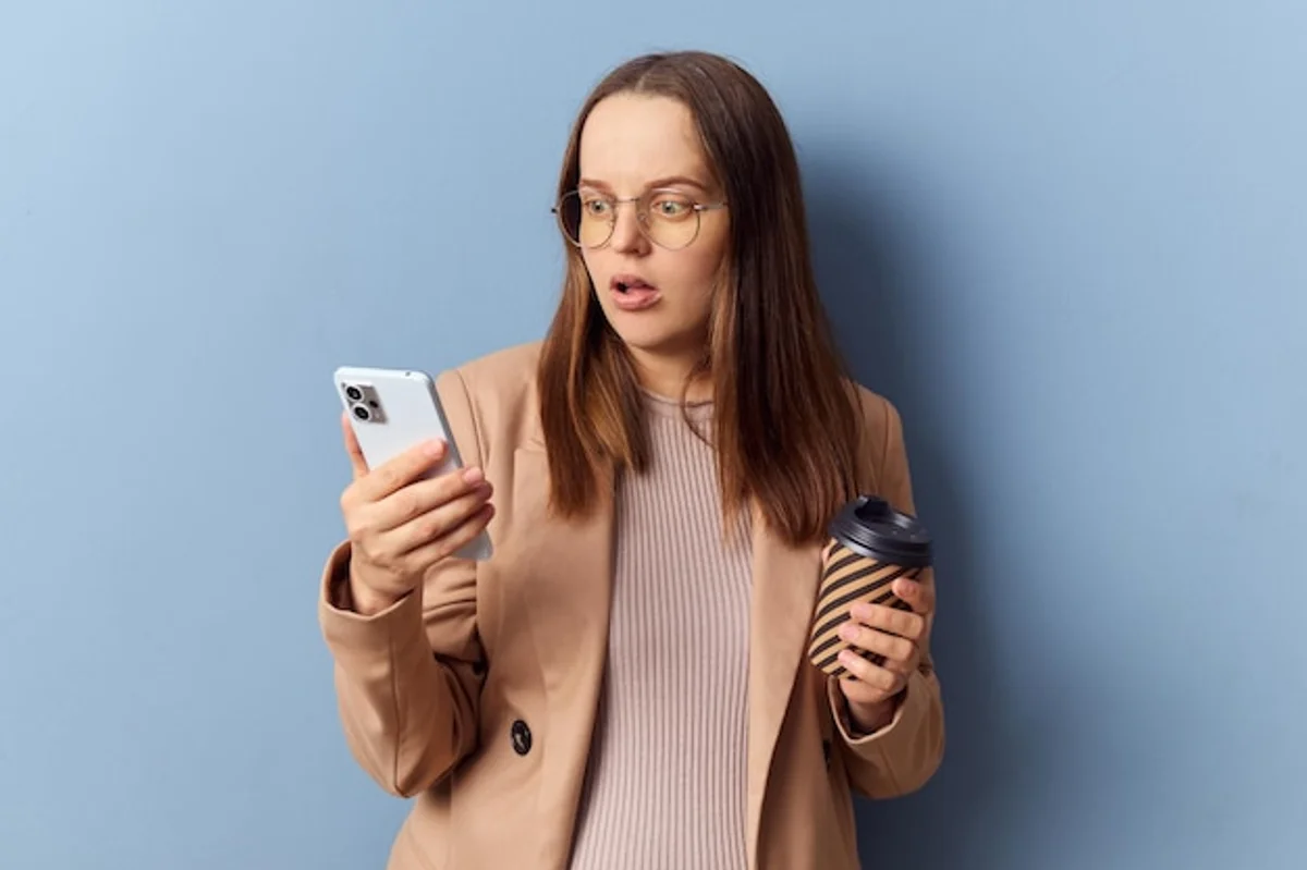 woman worried about digital privacy smartphone