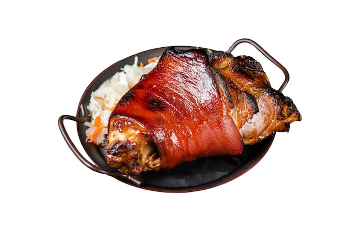 senior hands cutting fresh herbs in german kitchen