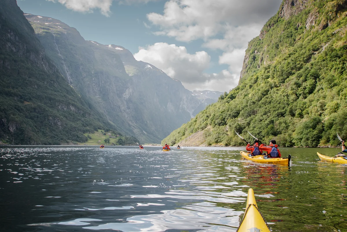 scandinavian fjord kayaking sustainable tourism