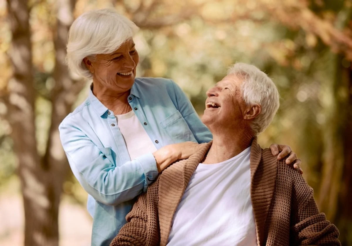 happy older people laughing in park outdoor germany