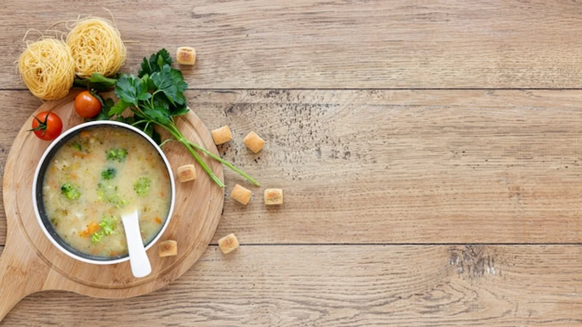 homemade croutons in rustic kitchen with old bread and herbs