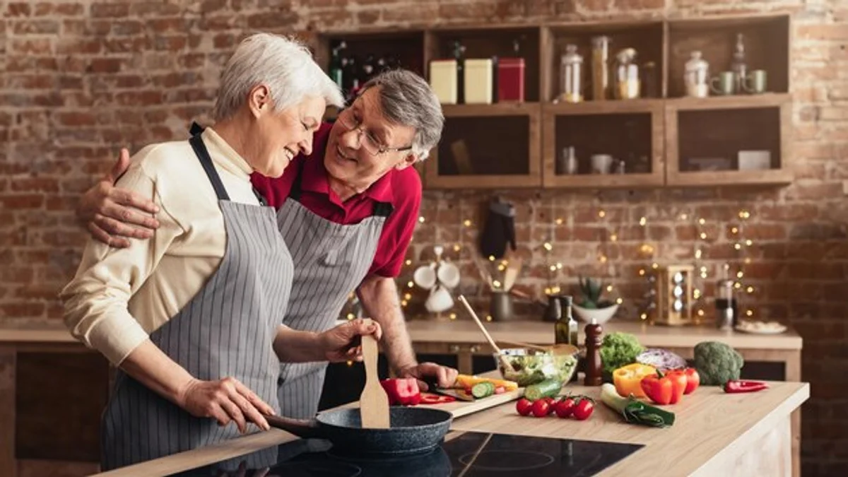 grandparents cooking together modern kitchen