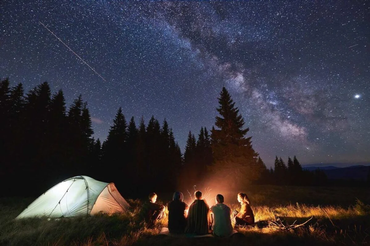 group of people stargazing dark sky park germany