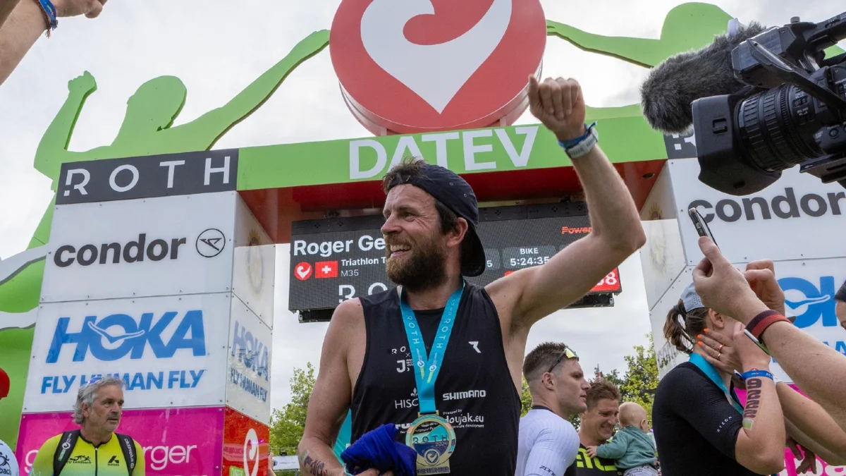 German triathlete breaking world record finish line celebration