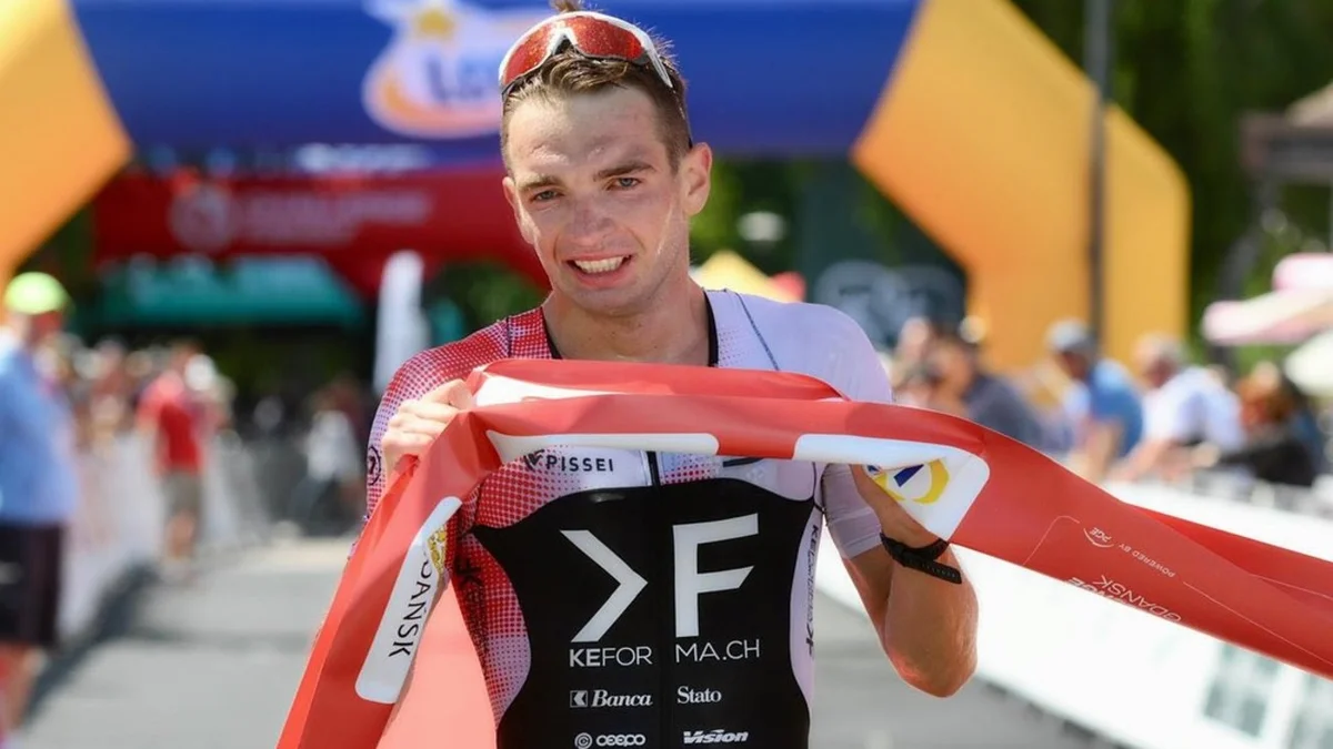 German triathlete breaking world record finish line celebration