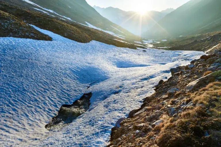 melting glacier alpine border Switzerland Italy
